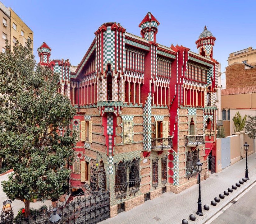 Exterior of Casa Vicens in Barcelona, a vibrant Gaudí-designed house featuring colorful tiles, Moorish-inspired patterns, and ornate ironwork