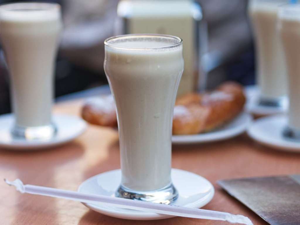 Glass of traditional Valencian horchata, a refreshing tiger nut drink