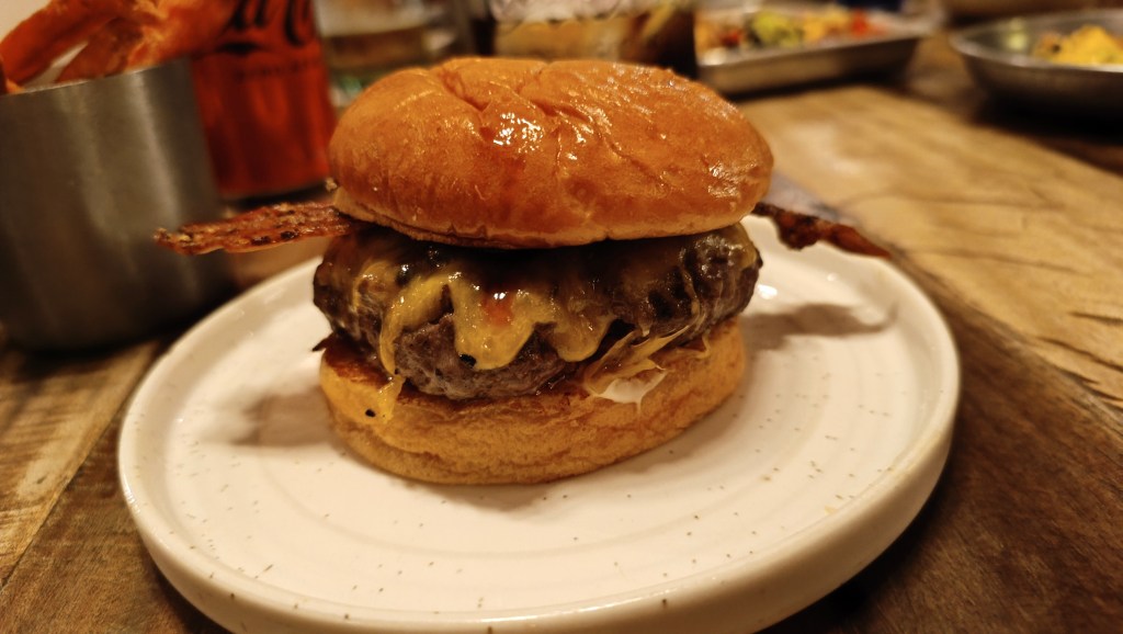 A gourmet burger from the Hundred Burger Place, considered one of the best burgers in the world, in Valencia, Spain.
