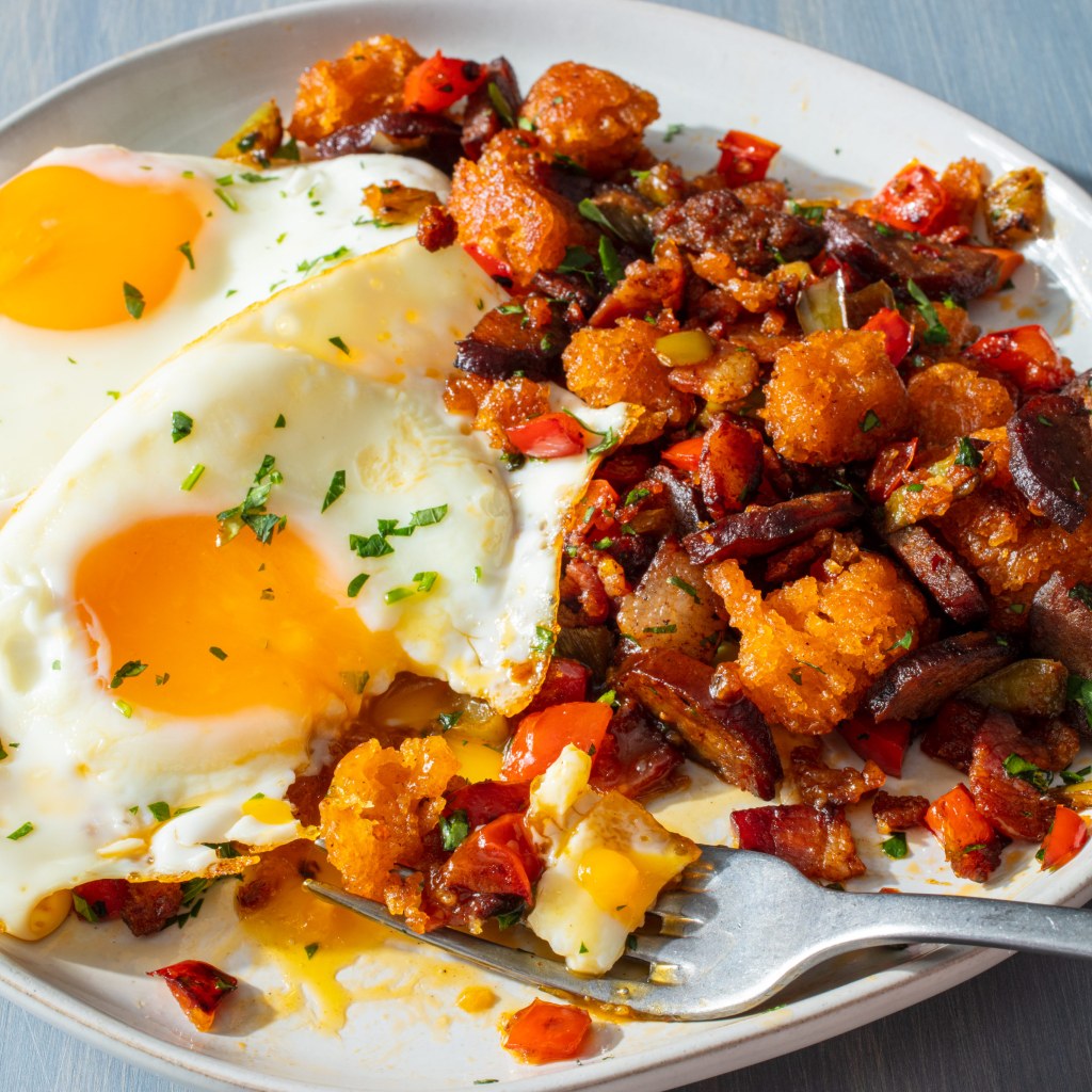 Traditional Spanish fried breadcrumbs with chorizo and egg