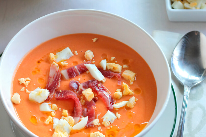 Chilled Córdoba tomato soup topped with jamón and boiled egg