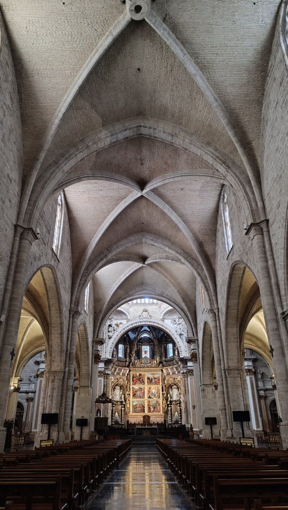 Interior of Valencia Cathedral showing ornate altars and Gothic architecture