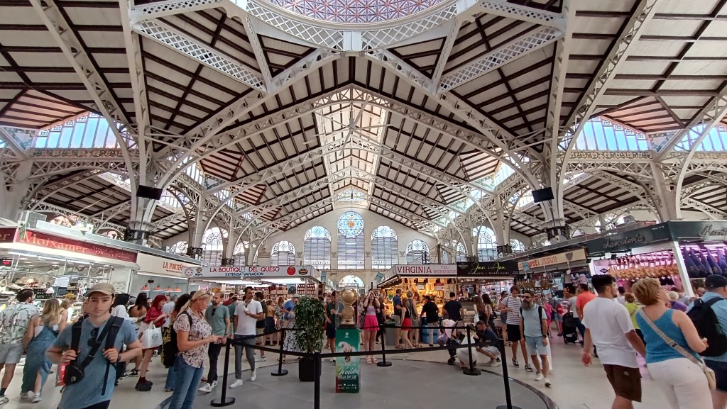 Interior of Mercado Central in Valencia, Spain, filled with fresh produce and local foods