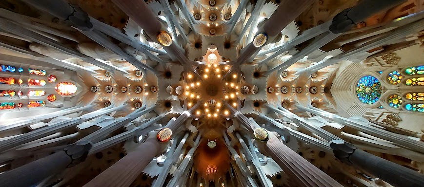 View of the altar ceiling shaped like a dove in the Sagrada Familia, representing the Holy Spirit