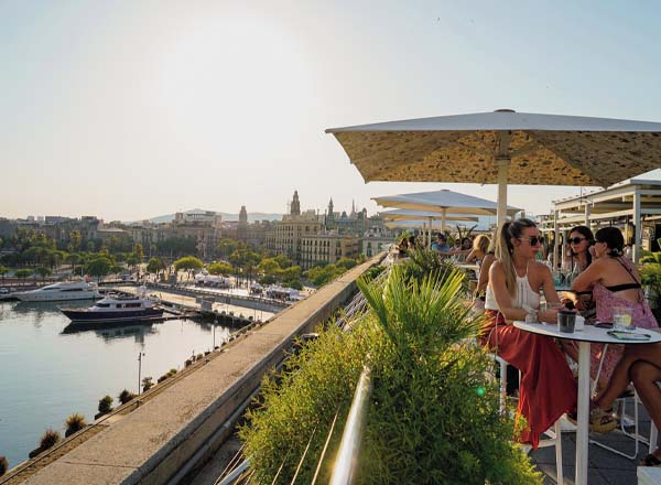1881 per Sagardi rooftop terrace with port and marina views in Barcelona