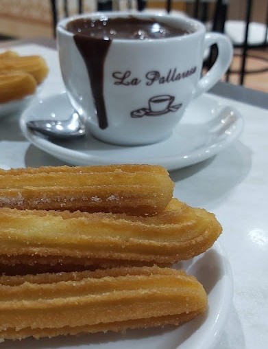 Carrer Petritxol narrow street in Barcelona Gothic Quarter, traditional xocolateries and art galleries