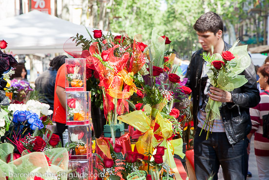 Roses and books displayed together during Sant Jordi celebrations.