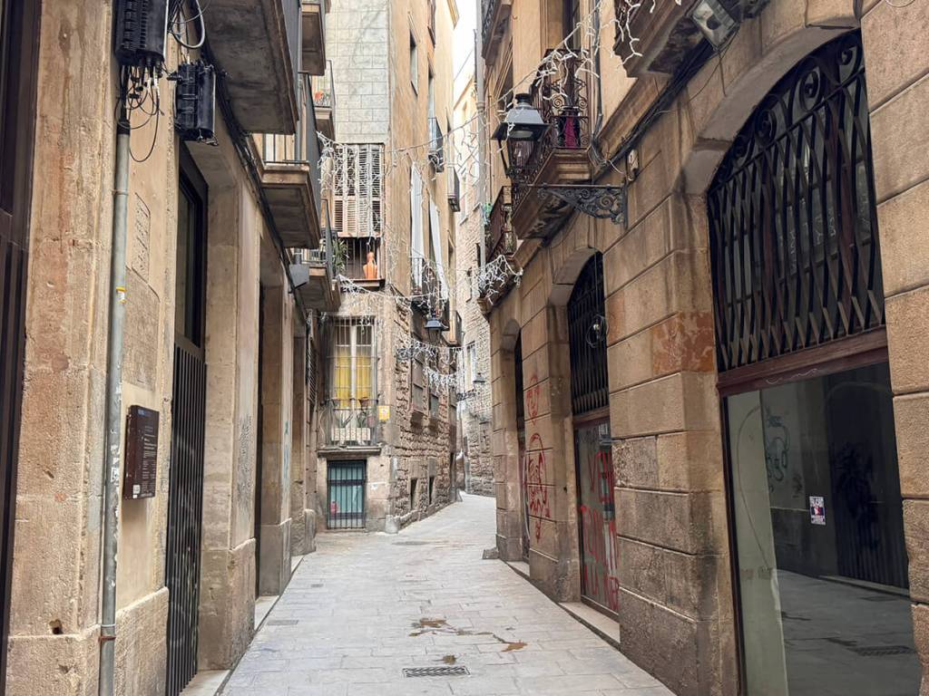 Carrer de Marlet in Barcelona’s Gothic Quarter, one of the city’s oldest narrow alleys lined with historic stone buildings
