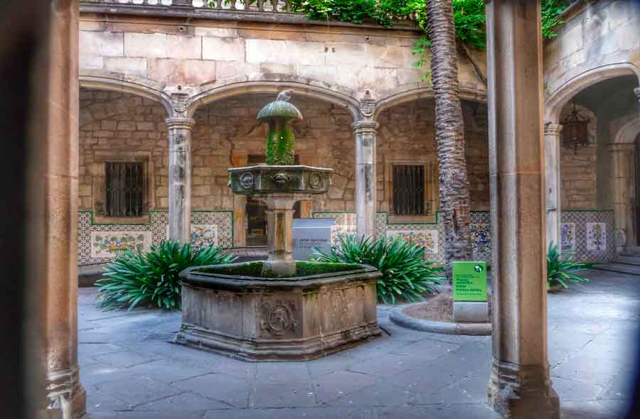 Casa de l’Ardiaca in Barcelona’s Gothic Quarter, a historic building with a serene courtyard and Gothic architectural details