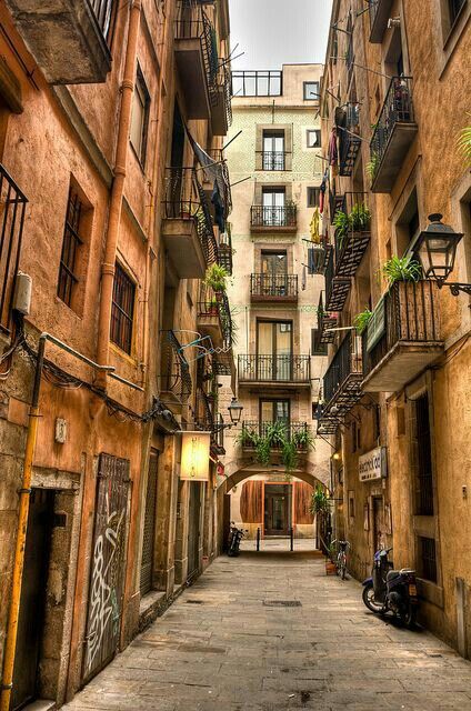 Quiet, narrow alley in the Gothic Quarter of Barcelona, perfect for exploring hidden corners